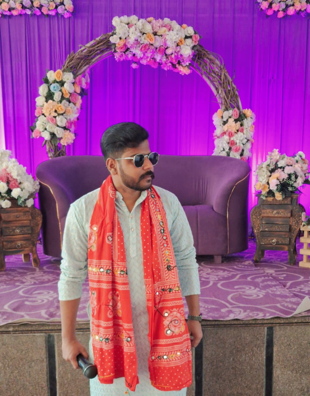 Anchor Himanshu Paliwal on a decorated wedding stage