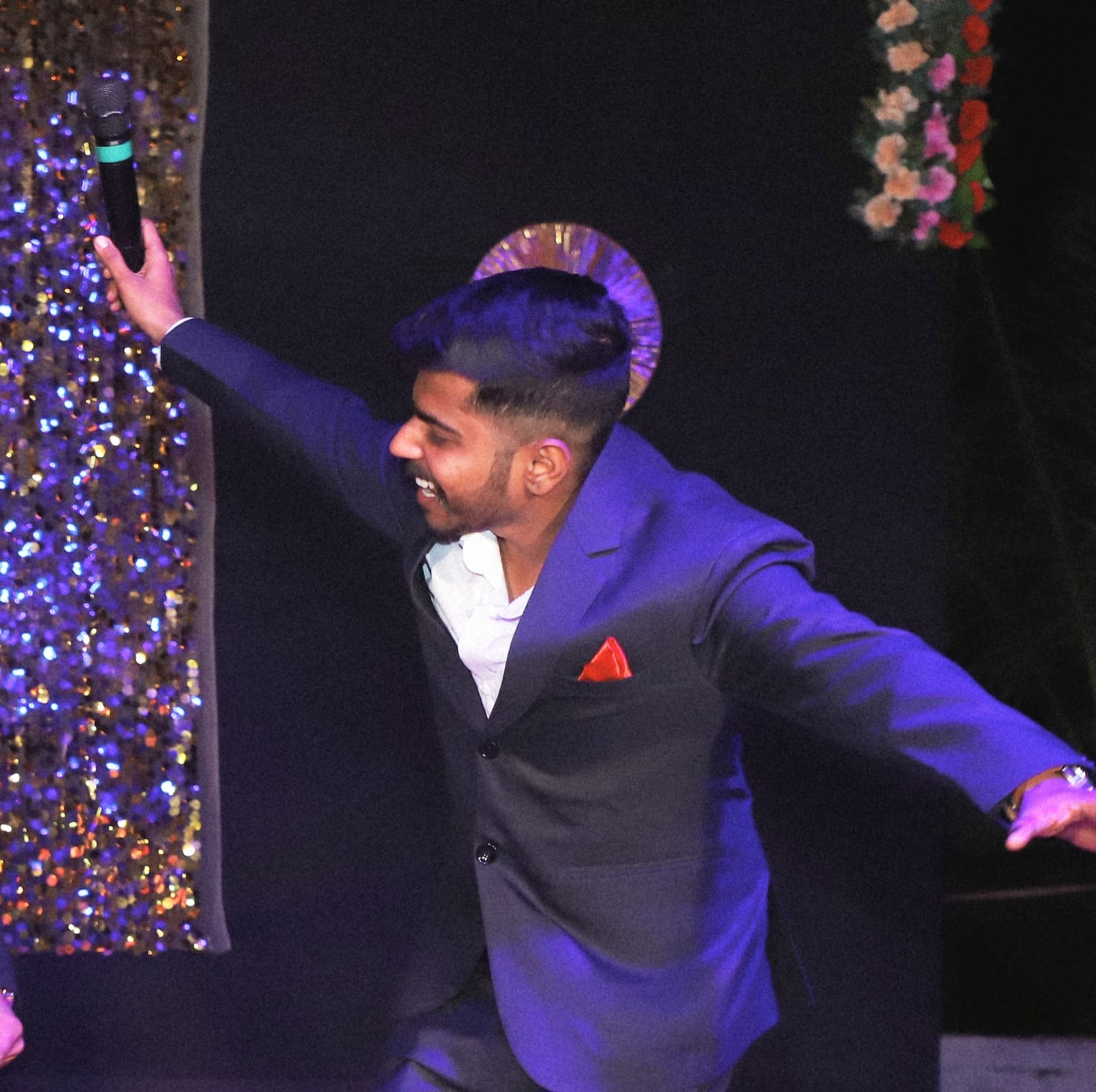 Anchor Himanshu Paliwal engaging guests during a live event